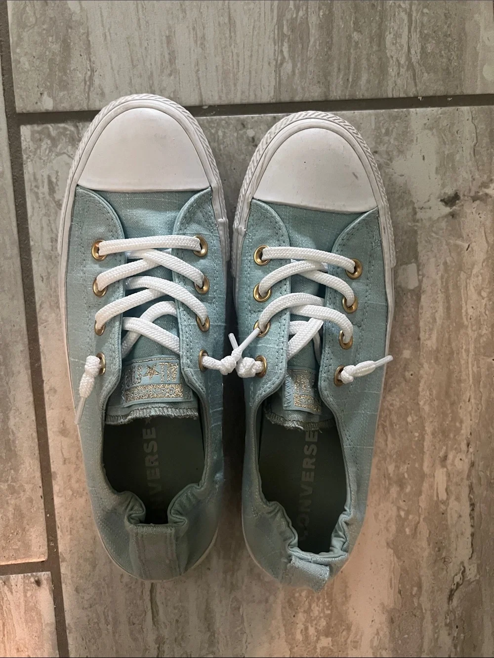 Converse Women’s Low Top Sneakers in light blue with White Accents